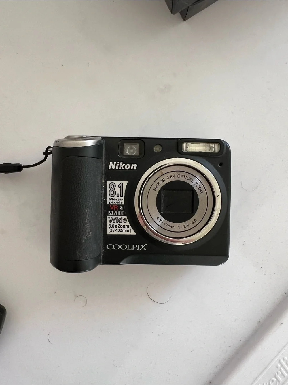 Nikon COOLPIX Compact Digital Camera in Black with Silver Lens Ring
